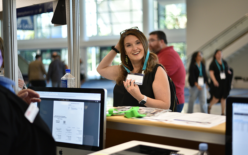 photo attendee getting badge